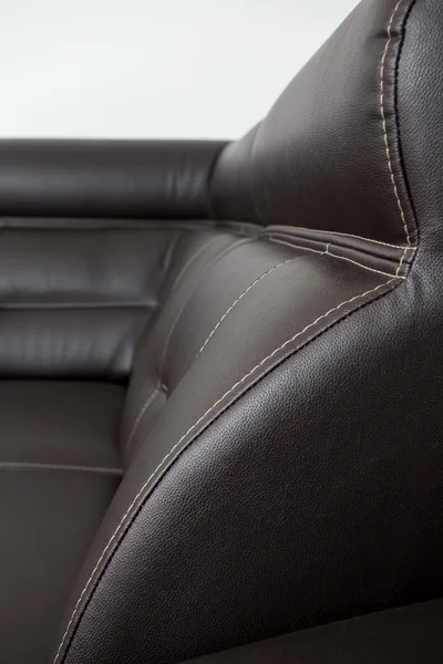 Black leather texture close-up, couch