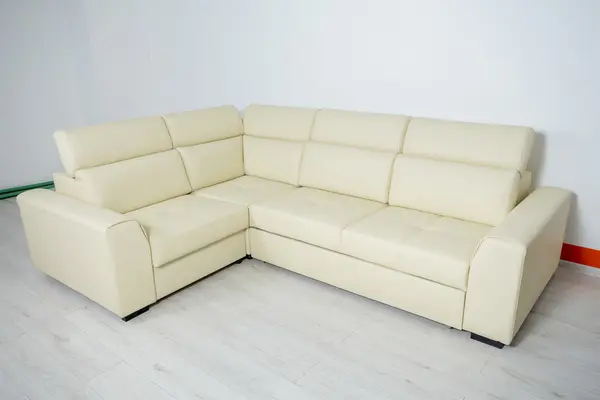 Color cream corner a large sofa on a white background