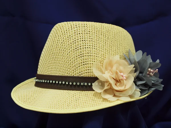 Hand-made hat weave decorated with flowers