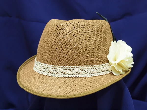 Hand-made hat weave decorated with flowers