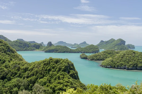 Angthong marine park near koh Samui, Thailand. Beautiful tropical island panoramic view with blue sky and water, exotic thai nature. Famous travel destination