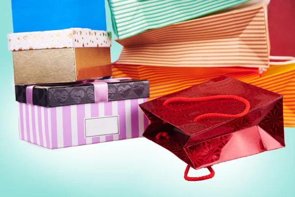 Colorful paper shopping bags and boxes