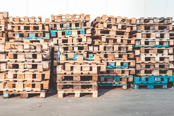 Old wooden pallets at sunset