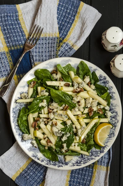 Spinach salad with apples blue cheese and walnuts