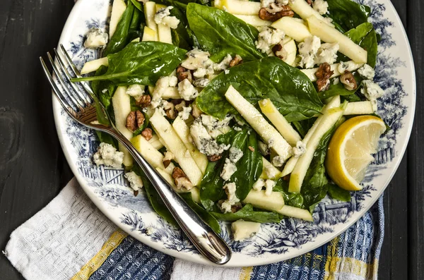 Spinach salad with apples blue cheese and walnuts