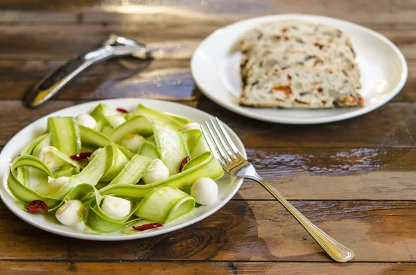 Zucchini salad with mini mozzarella and chilli from Jamie Oliver and meatloaf with mushrooms peppers and zucchini