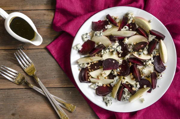 Apple salad with beetroot and walnuts blue cheese