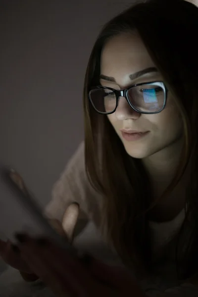 Woman in glasses  with  tablet pc