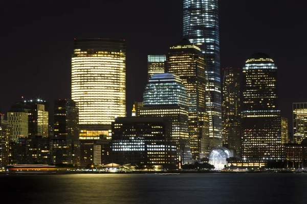 NEW YORK CITY, USA - AUGUST 30, 2014. View of Lower Manhattan skyline at night from Exchange Place in Jersey City
