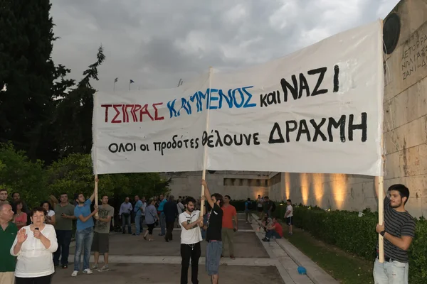 Athens, Greece, 30 June 2015. Greek people demonstrated against the government about the upcoming referendum. People in the demonstration are in favor of voting yes in the referendum.