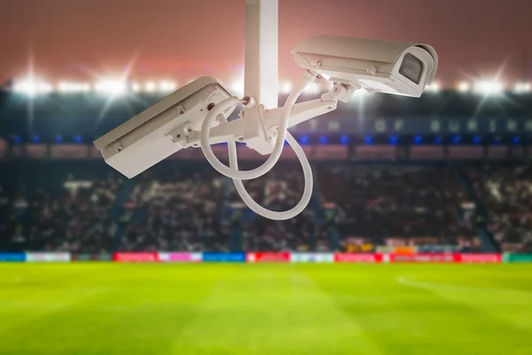 CCTV security in stadium football twilight background.