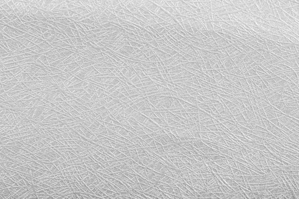 Grey silver paper foil on background texture.
