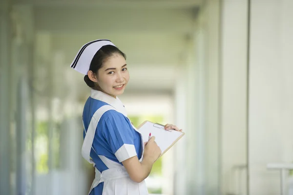 Beautiful young nurse on duty