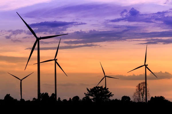 Wind turbines, wind farms silhouette at sunset in Thailand