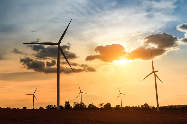 Wind turbines, wind farms silhouette at sunset in Thailand