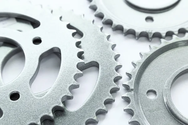 Bicycle sprocket coated with coating powder isolated on white.