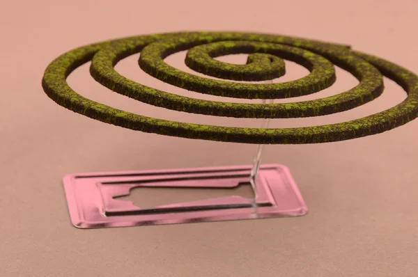 Burning mosquito coil, Mosquito coil is mosquito-repelling incense, usually shaped into a spiral, Anti mosquito made by neem leaves green color - insecticides