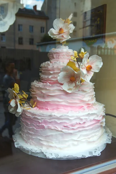 A wedding cake with flowers