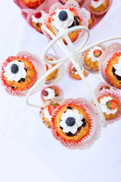 Wedding cupcakes in iron baskets