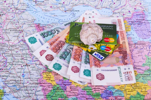 Money and credit cards are on the map, Russia, Moscow, 2015
