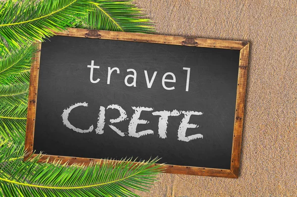 Travel Crete palm trees and blackboard on sandy beach