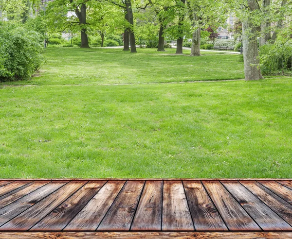 Wooden terrace with lawn