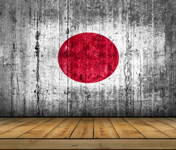 Japan flag painted on background texture gray concrete with wooden floor