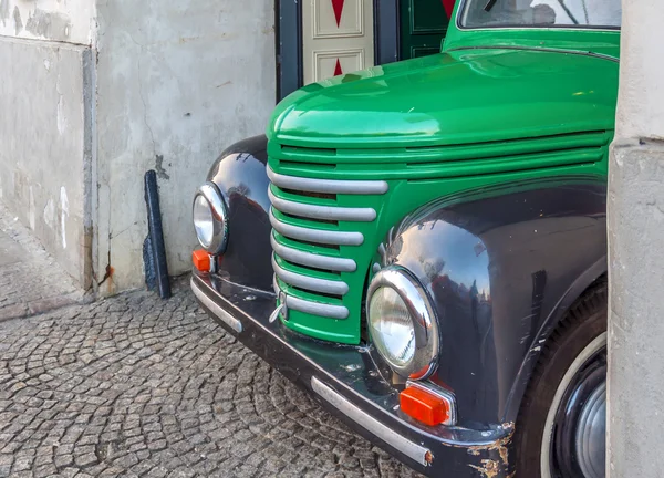 WARSAW, POLAND - JANUARY 04, 2016 Classic Chevrolet Pickup truck in Podwale 25 street in Warsaw Old Town loaded with a lot beer barrels