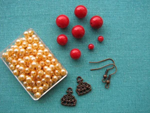 Beads and other pieces for making earrings, handmade jewelry