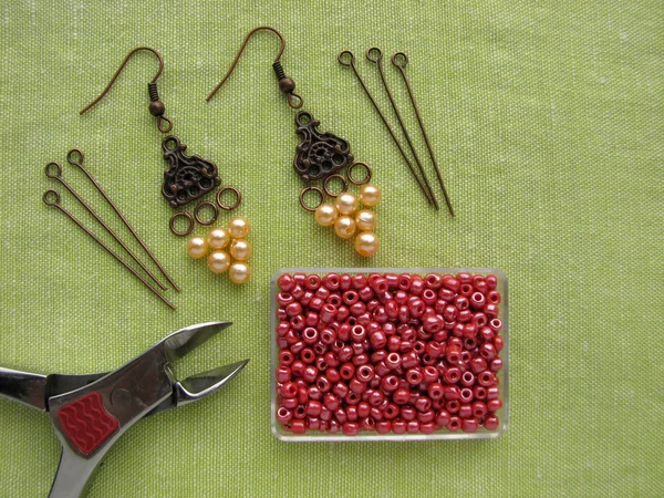 Beads, furniture and tools for making earrings, handmade jewelry