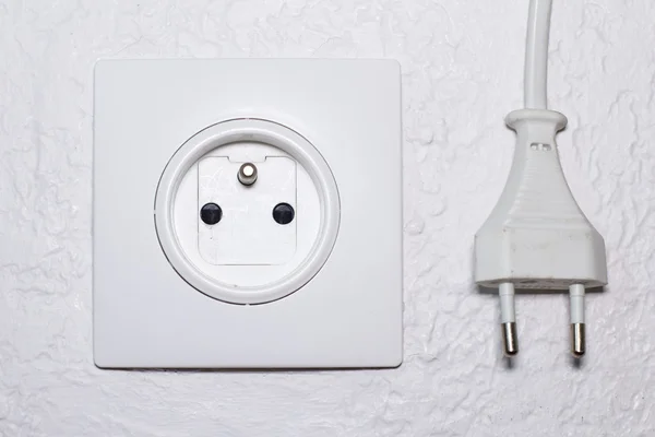 Wall socket and electrical plug