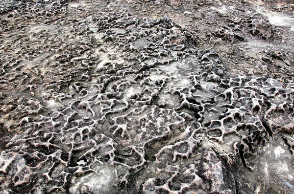 The surface of the stone caused by nature.