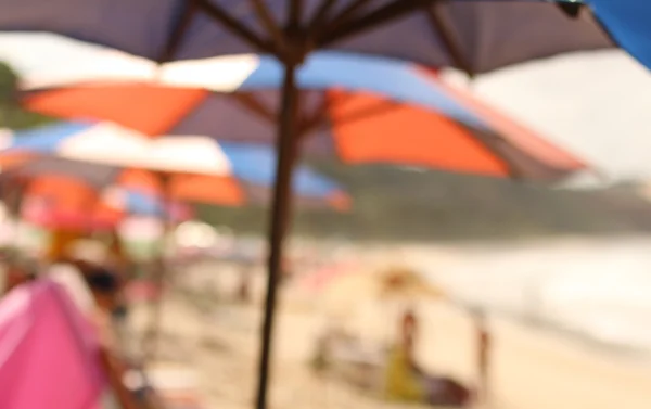 Blurred sun umbrellas on a beach
