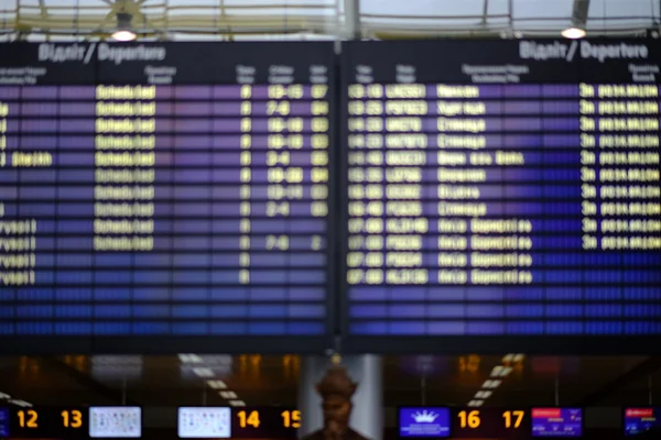 Blurred display of plane schedule flight board