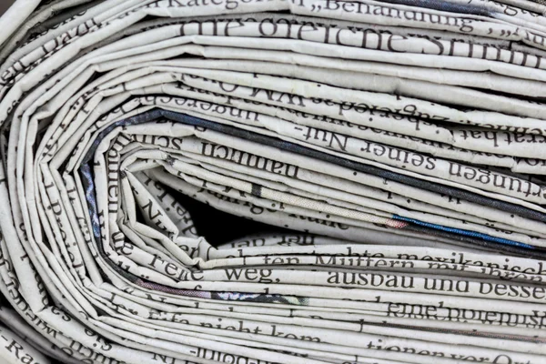 Stack of old newspapers, pile of old newspapers