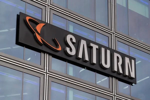 Saturn store logo on building facade