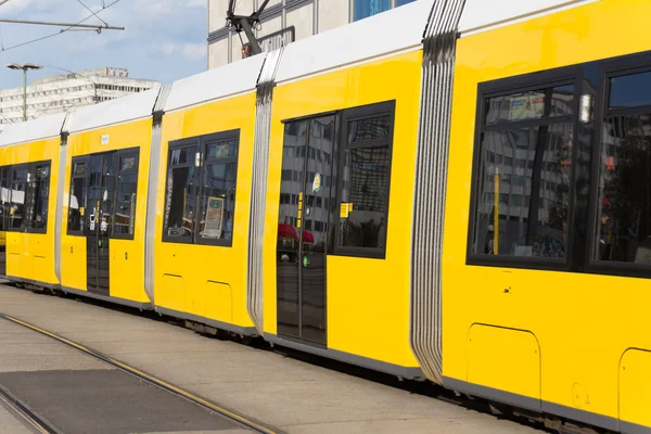 Electric tram train at Alexanderplatz in Berlin, Germany.