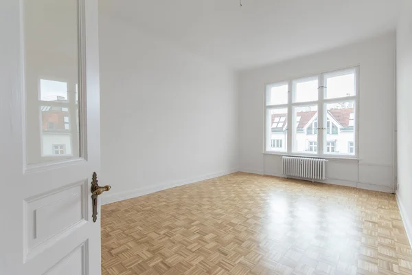 Empty room, fresh renovated flat with wooden floor,
