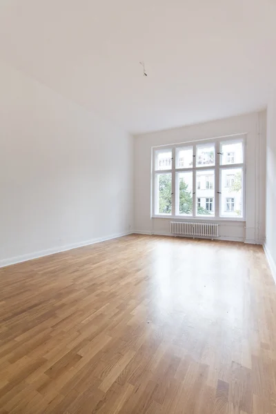 Empty room, fresh renovated flat with wooden floor,