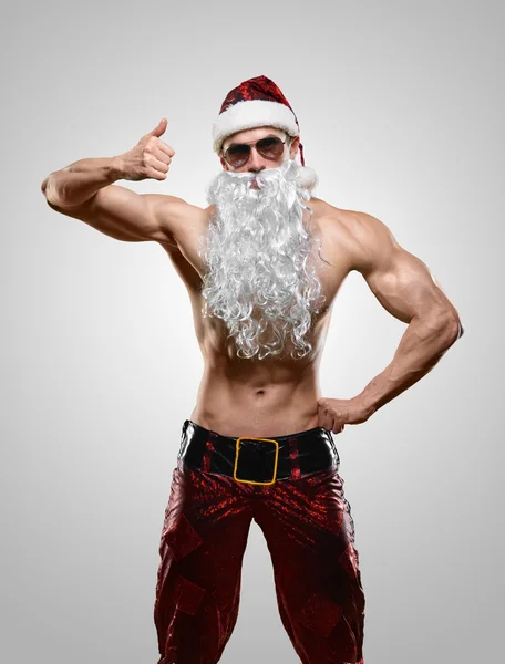 Muscular handsome sexy Santa Claus