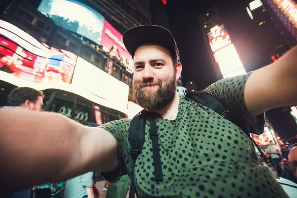 Funny bearded man taking selfie
