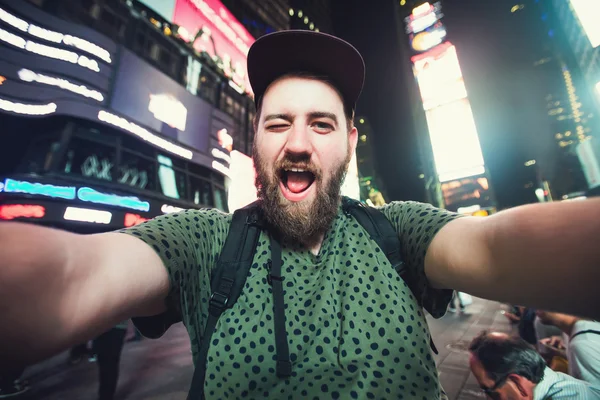 Funny bearded man taking selfie