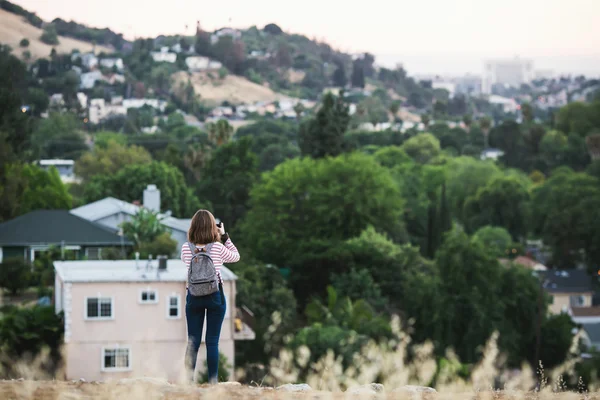 Girl taking pictures in Pasadena, California