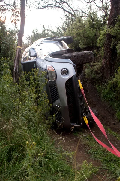 The car  Mitsubishi Triton rolled over while doing off-road trail. Vehicle recovery.