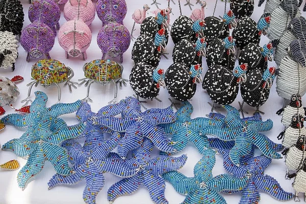 African traditional handmade colorful bead toys animals, starfishes.