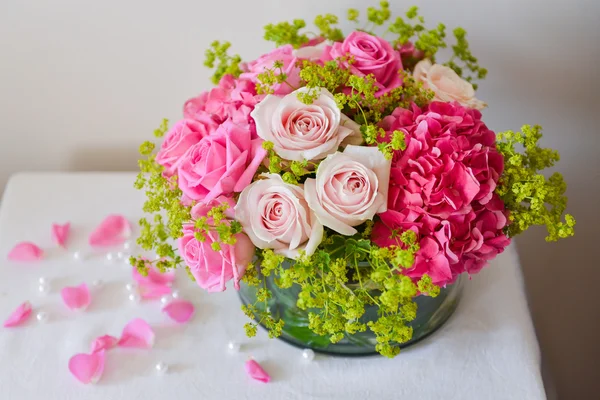 Pink flowers in a vase on the table