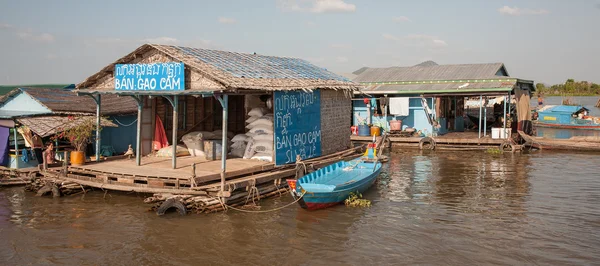 Warehouse with building materials on the water works on ozereTonlesap in Cambodia.