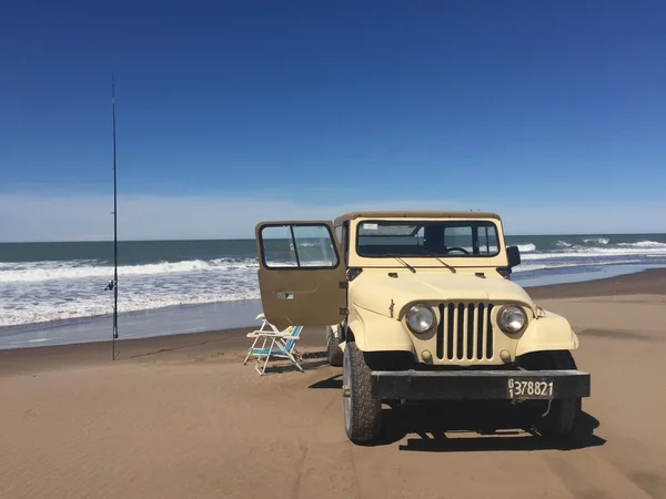 Jeep Wrangler on seashore
