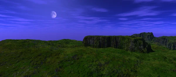 View from a height on a green plateau surrounded by a blue light