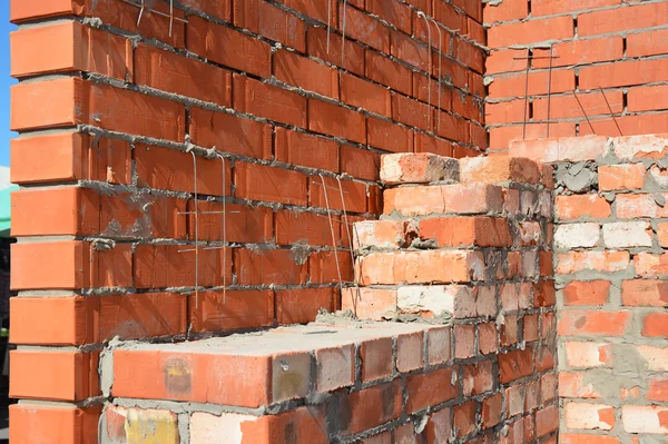 Close up on Bricklaying House Construction Site. Bricklaying Facing Brick Basics Masonry Techniques.How To Lay Bricks Like A Bricklayer. DIY Bricklaying.